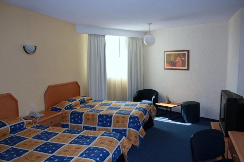 Hotel Valle De Mexico Toreo Cidade do México Quarto foto